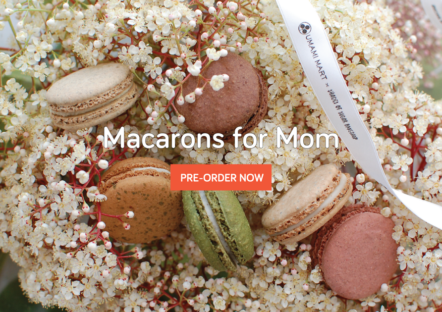 Macarons for Mom, showing all the flavors of the special box for Mother's Day. Macarons floating in a cloud of flowers.