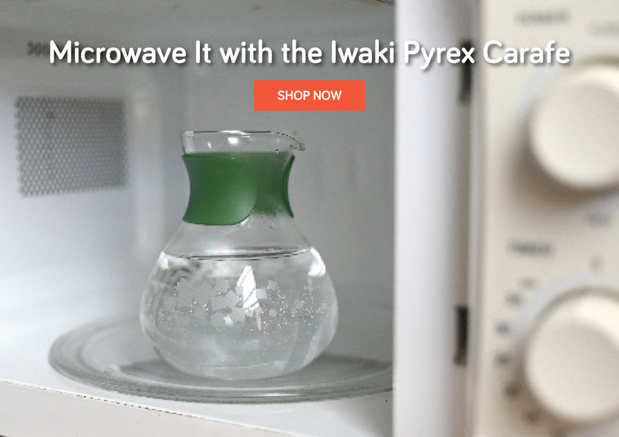 Iwaki Pyrex Glass Carafe in a microwave oven.