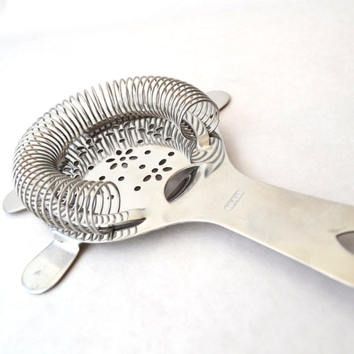 hawthorne strainer short Ideal for fast-moving bartenders or for bars with limited space, this Hawthorne strainer is light, easy to use, and ergonomic, thanks to the thumb rest. Shake or stir your cocktail, and the tight coil helps to better strain out ice and any other ingredients as you pour the drink into a glass.